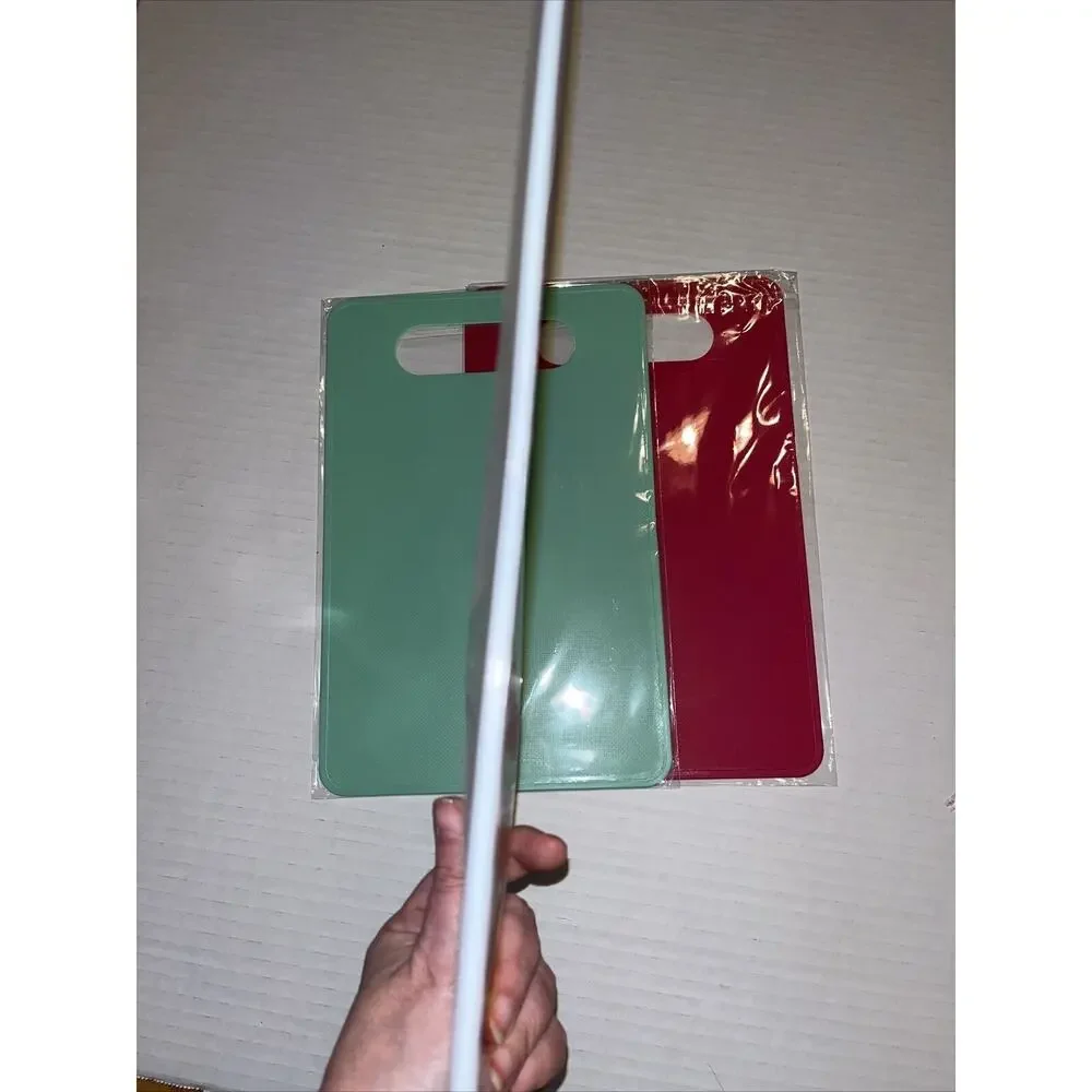 Set Of Four Thin Plastic Cutting Boards 71/2 inches by 11 1/2 inches